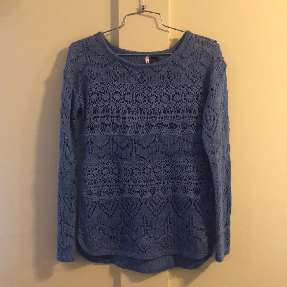 Blue sweater.